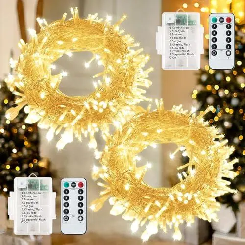 Produktbild: (2 Stück) 60 LED Lichterkette Weihnachten Batterie, 7M/8 Modi Lichter Außen / Innen, IP65 wasserdicht mit Timer Fernbedienung für Weihnachten, Hochzeit,Balkon,Garten, Party Dekoration (warmweiß)