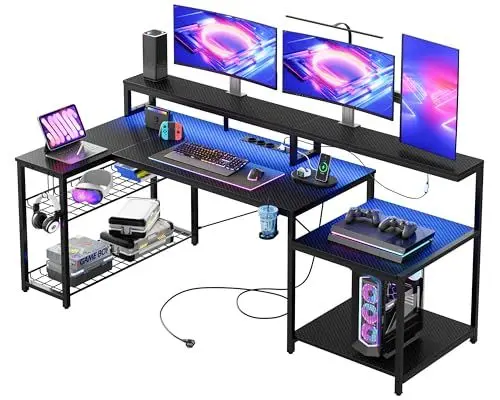 Produktbild: Bestier Gaming Tisch, 181x80 cm Schreibtisch mit LED-Leuchten, L-förmiger Schreibtische mit 3 AC-Steckdosen und 2 USB Ladeanschluss, Computertisch mit großzügiger Monitorablage, Kohlefaser Schwarz
