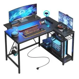 Produktbild: Bestier Gaming-Eckschreibtisch L-Form 106,5 cm – mit LED, Steckdosen, 2 Regalen & Haken – Umkehrbarer Computertisch für kleines Büro, Schlafzimmer & Gaming-Setup