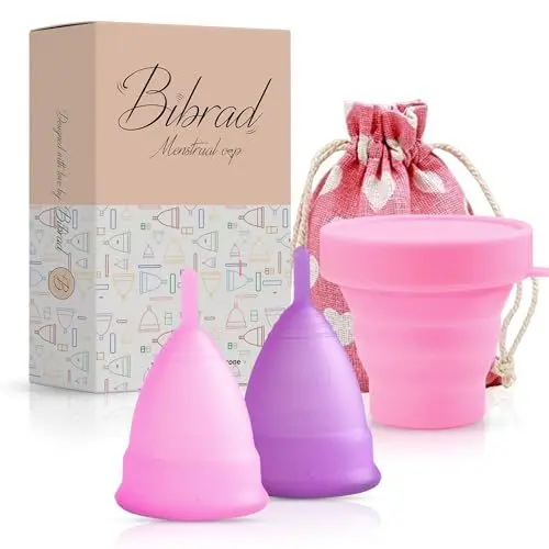 Produktbild: Bibrad Menstruationstasse - 2 Menstruationstassen der Größen M und L, Sterilisator und Baumwolltragetasche - 100% weiches medizinisches Silikon, waschbar und wiederverwendbar (M-L)