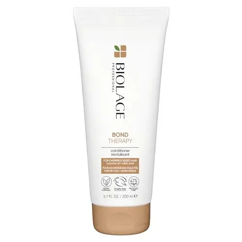 Produktbild: Biolage Conditioner für geschädigtes oder überstrapaziertes Haar, Mit Kokosnussöl und Zitronensäure, Stärkt Haarbrücken, Reduziert Haarbruch und beugt Spliss vor, Vegan, Bond Therapy, 1 x 200 ml