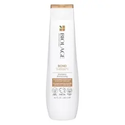 Produktbild: Biolage Shampoo für geschädigtes und überstrapaziertes Haar, Mit Kokosnussöl und Zitronensäure, Stärkt Haarbrücken, Reduziert Haarbruch und beugt Spliss vor, Vegan, Bond Therapy, 1 x 250 ml