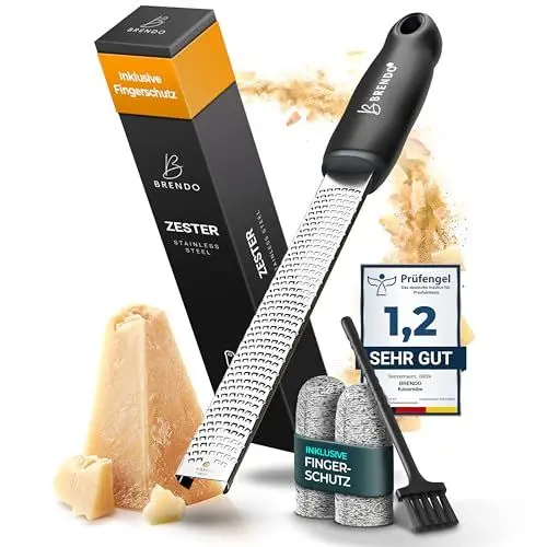 Produktbild: Brendo Premium Zester Reibe I Käsereibe Schwarz I Edelstahlklinge I Knoblauchreibe, Muskatnuss Reibe, Zitronenreibe, Ingwerreibe, Parmesanreibe I Fingerschutz, Schutzhülle & Reinigungsbürste