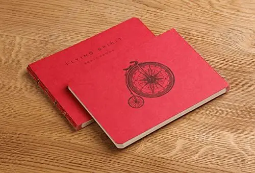 Produktbild: Clairefontaine 930034C - Skizzenheft Flying Spirit DIN A6, 50 Blatt, elfenbeinfarbiges Papier, ideal für Notizen, trendig, mit Sepia-Aufdruck, Rot Motive sortiert, 1 Stück