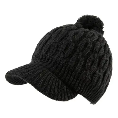 Produktbild: Comhats 50% Wolle Winter Schirmmütze Damen Bommelmütze Strickmütze mit Schirm Bommel Warme Beanie Skimütze Outdoor Schwarz