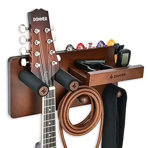 Produktbild: Donner Gitarren Wandhalterung mit Ablage, Gitarrenwandhalter mit Plektrumhalter und 2 Haken, Gitarrenhalter aus Holz für E-Gitarre, Akustikgitarre, Bass, Ukulele, Violine und Gitarrenzubehör