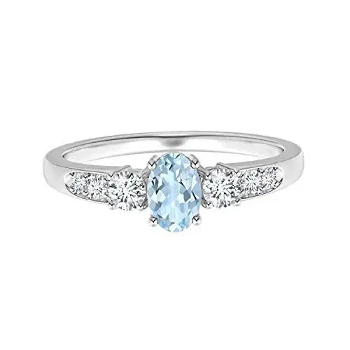 Produktbild: Drei Stein 5 x 7 mm ovaler blauer Aquamarin-Edelstein 925er Sterling Silber Weißer Zirkonia-Ring mit Seitenakzenten (Silber, 19)
