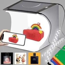 Produktbild: DUCLUS Foto Lichtbox 24x23x22cm, Mini fotostudio Lichtzelt mit 2x20 LED Beleuchtung,Tragbare Faltbare Fotozelt für Fotografie Kleine Gegenstände, Wie Schmuck, etc. Mit 6 Photo Box Hintergrund.