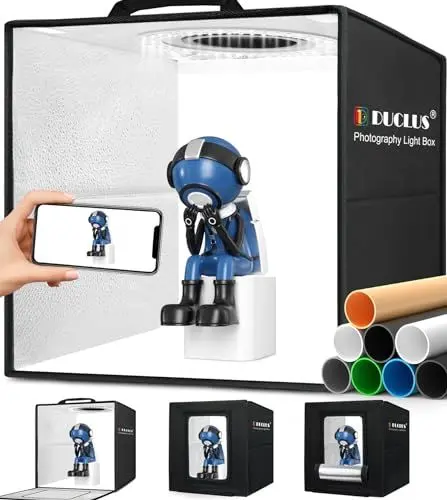 Produktbild: DUCLUS Fotobox für Fotografie, 30 cm Fotobox für Produktfotografie, Faltbares Mini Fotostudio Set mit dimmbaren 112 LEDs, 8 Glatte Hintergründe für Lichtzelt für Schmuck Kleinteile