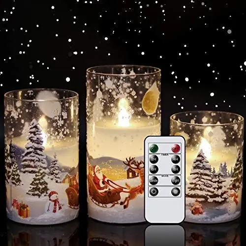 Produktbild: Eldnacele, LED-Stumpenkerzen im Glas mit Weihnachtsmann-/Schlitten-Motiv, flackernd, flammenlos, mit Fernbedienung, Timer, batteriebetrieben, Echtwachs, 3 Stück, für Heim-Weihnachtsdekoration