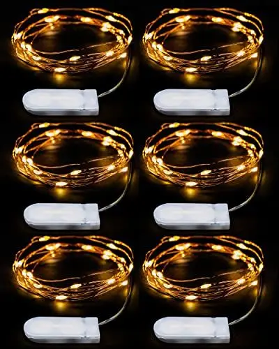 Produktbild: EMOS Micro LED Lichterkette Kupferdraht 2m, 20 LEDs | LED Deko für Party, Hochzeit, Weihnachten etc. | Lichterkette Batterie CR2032 | Lichterdraht für innen, Farbe warmweiß, Set mit 6 Stück