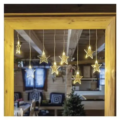 Produktbild: EMOS Mini Lichtervorhang mit 8 Sternen, LED-Lichterkette 84cm mit Sternen, Warmweiß, Lichtergirlande + Netzteil, Leuchtdauer 10.000 h, IP44 für Innen und Außen, für Party, Weihnachten, Deko