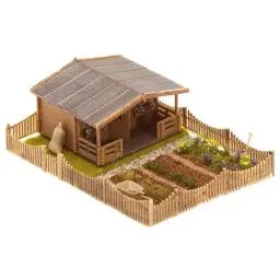 Produktbild: FALLER Schrebergarten mit großem Gartenhäuschen Modellbausatz mit 68 Einzelteilen 105x74x36mm I Modelleisenbahn Zubehör H0 I Modelleisenbahn H0 Garten, Braun