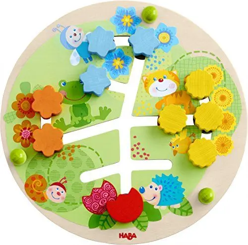 Produktbild: HABA 303852 - Motorikbrett Blumen , Holzspielzeug ab 12 Monaten , Lustiger Schiebespaß mit buntem Blumenwiesenmotiv , Rückseite mit Zahlenspiel