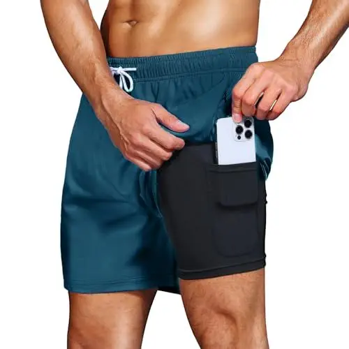 Produktbild: HMIYA Badehose Herren 2 in 1 Badeshorts Schwimmhose Schnelltrocknend Kurz Boardshorts mit Kompression und Reißverschlusstaschen(Pfauenblau 3XL)