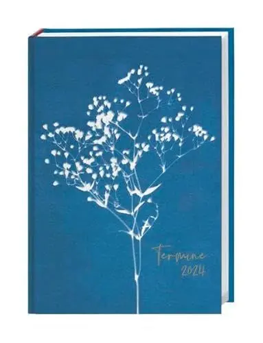 Produktbild: Indigo Kalenderbuch A5 2024. Weiß auf dunklem Blau: Dieser Taschenplaner 2024 ist ein optisches Highlight! Buchkalender mit Blumen-Motiven für alle wichtigen Termine und Notizen.