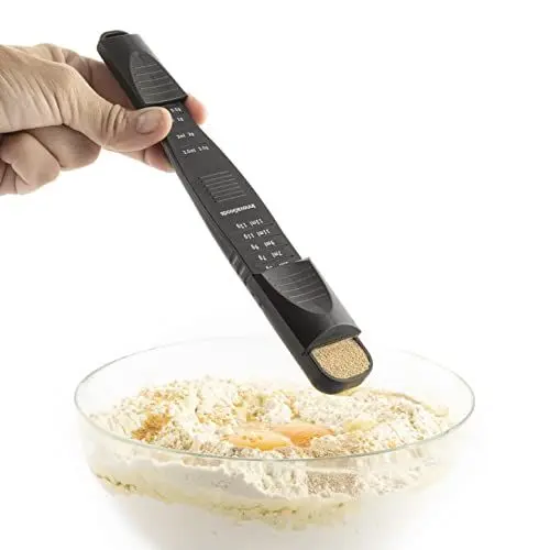 Produktbild: InnovaGoods® Verstellbarer 9-in-1-Messlöffel Ninoon, praktisch und präzise, Maße in Gramm und Millilitern, geeignet für Flüssigkeiten und Feststoffe, einfach zu verwenden und zu verstauen.