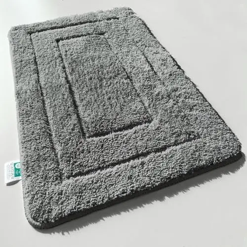 Produktbild: KARAT Badteppich Atlantis - extra flauschig & schnelltrocknend - Badezimmerteppich mit rutschsicherer Rückseite - Badematte Duschvorleger (70 x 120 cm, Dunkelgrau)