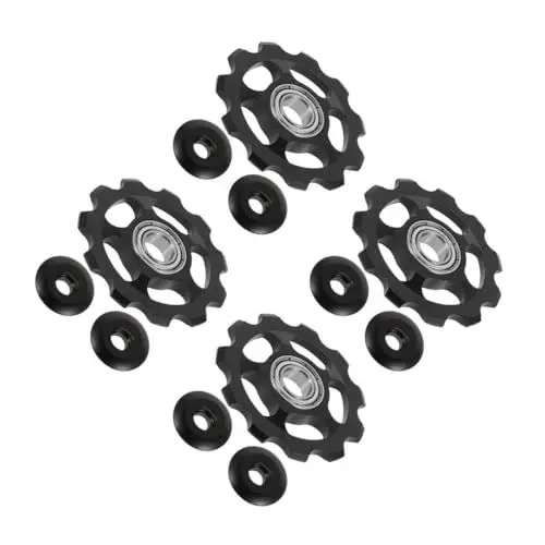 Produktbild: Kisangel 4 Stück Mountainbike Teile Der Schaltwerkrolle Umwerferrolle Am Hinterrad Teil Der Schaltwerksrolle Riemenscheiben des Schaltwerks Hintere Führungsräder Aluminiumlegierung Black