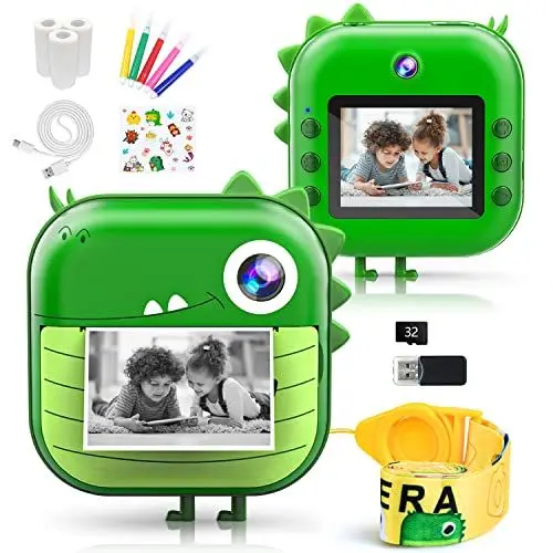 Produktbild: Kizeefun Sofortbildkamera Kinder, Dinosaurier Kamera Kinder 1080P-HD, Schwarzweiß-Fotografie, 32GB Speicherkarte, 3 Rollen Druckpapier, 5 Farb-Pinselstiften, Geschenk für Jungen Mädchen