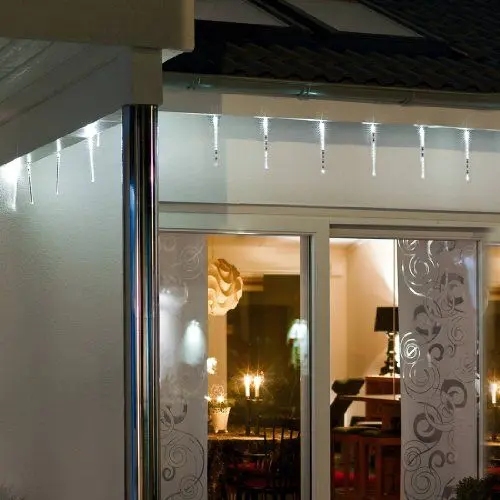 Produktbild: Konstsmide LED Leuchtstäbe Lichtervorhang, 6 Stäbe, funkelnder Schneeeffekt, 60 warm weiße Dioden, 9V Außentrafo, transparentes Kabel - 2765-103