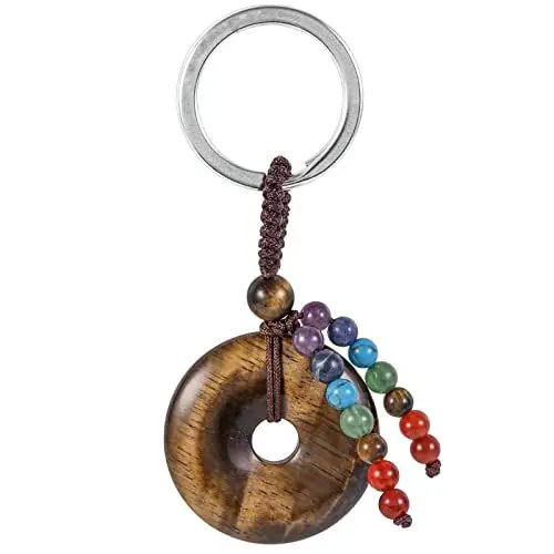 Produktbild: KYEYGWO Tigerauge Kristall Friedensschnalle Schlüsselanhänger für Unisex, 7 Chakra Stein Schlüsselring Deko Runde Taschenanhänger Heilstein Donut Anhänger für Amulett und Glücksbringer
