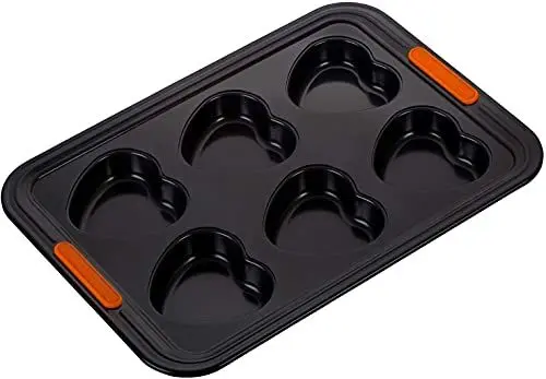 Produktbild: Le Creuset Antihaft Herz-Muffinform, Für 6 Stück, PFOA-frei, Sauerteigbeständig, Aus Karbonstahl gefertigt, Anthrazit/Orange