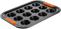Produktbild: Le Creuset Antihaft Muffinform, Für 12 Stück (Ø 7 cm), Sauerteigbeständig, Aus Karbonstahl gefertigt, Anthrazit/Orange, 94100140000000