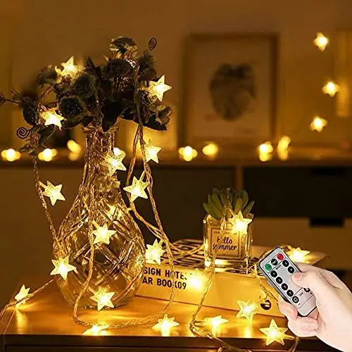 Produktbild: Lezonic 7m 60LED Sterne Lichterkette mit Fernbedienung 8 Modi Wasserdicht Außen Innen Weihnachten Lichterketten für Zimmer Party Garten DIY Deko Warmweiß