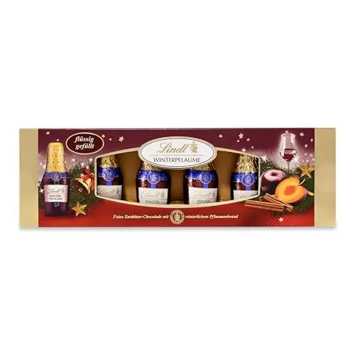 Produktbild: Lindt Schokolade Winterpflaume Fläschchen | 131 g | Feine Zartbitter-Schokolade gefüllt mit winterlichem Pflaume-Zimt-Likör, alkoholhaltig | Weihnachtsschokolade | Schokoladengeschenk