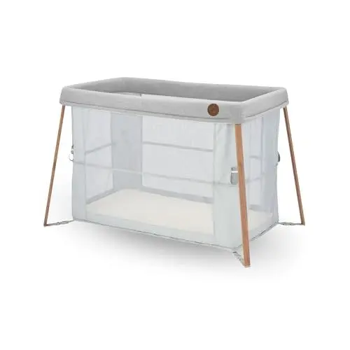 Produktbild: Maxi-Cosi Iris 2-in-1-Reisebett Baby, 0 – 3 Jahre, bis zu 15 kg, kompaktes Reisebettchen, 2 Schlafebenen, faltbar, Schaumstoffmatratzen, Seitenteile aus Netzmaterial, Reisetasche, Essential Grey