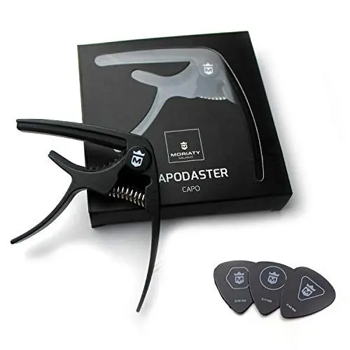 Produktbild: MORIATY® QuickChange Kapodaster für Gitarre + 3 Plektren + Gitarrenschule — Extrem robuster Capo für Westerngitarre, Akustikgitarre, Konzertgitarre, E-Gitarre, Banjo & Ukulele