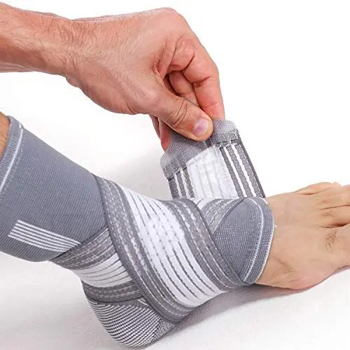Produktbild: NEOtech Care Sprunggelenkbandage zur Unterstützung - elastischer & atmungsaktiver Stoff - verstellbarer Kompressionsriemen - Männer, Frauen - linker oder rechter Fuß (Grau, 1 Einheit, Größe M)