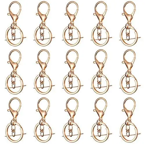 Produktbild: NUOBESTY 50 Stück kleine schwenkbare Karabiner Haken mit Schlüsselring Schlüsselanhänger Haken Gold