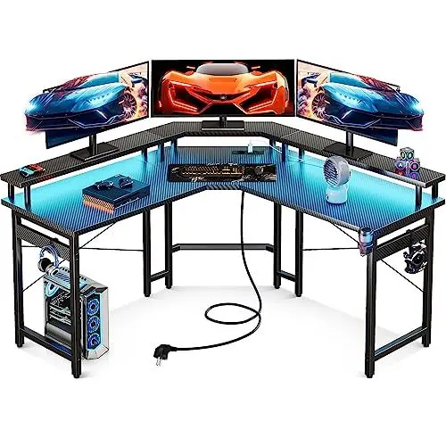 Produktbild: ODK Gaming Tisch 129x129 cm, Gaming Schreibtisch mit LED, PC Tisch Gaming mit 2 Steckdosen und 2 USB Ladeanschluss, Computertisch mit großzügiger Monitorablage, Kohlefaser Schwarz