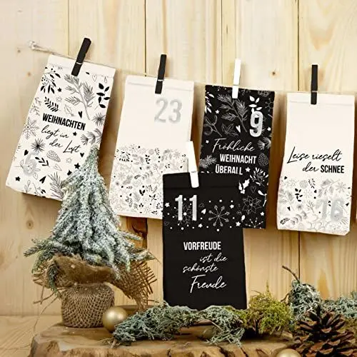 Produktbild: Papierdrachen Adventskalender zum Befüllen - 24 schwarze und weiße bedruckte Geschenktüten und 24 Zahlenaufkleber - Motiv Holy Night black & white 2 - zum Basteln und Verschenken - Weihnachten