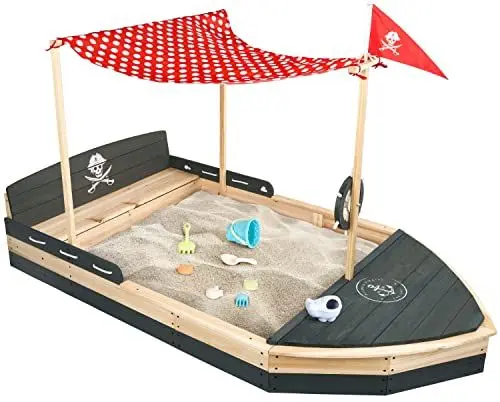 Produktbild: Piratenschiff Sandkasten aus Holz | Boot | Segelschiff | Sandkiste | Sandbox mit rotem Sonnensegel & Flagge, Abdeckung, Vlies Bodenplane, Kordel, Flaggenmast & Steuerrad für Kinder Anthrazit/Grau