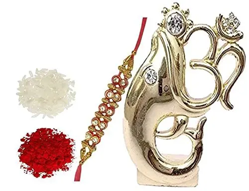 Produktbild: Purpledip Traditionelle Rakhi f?r Brother: Ganesh Statut, Designer Rakhi & auspicous Roli chawal in rot Paan Verpackung (rakhi62b) (Kupfer)
