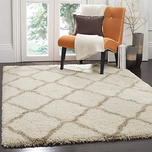 Produktbild: SAFAVIEH Zottelig Teppich für Wohnzimmer, Esszimmer, Schlafzimmer - Hudson Shag Collection, Hoher Flor, Elfenbein und Beige, 155 X 229 cm