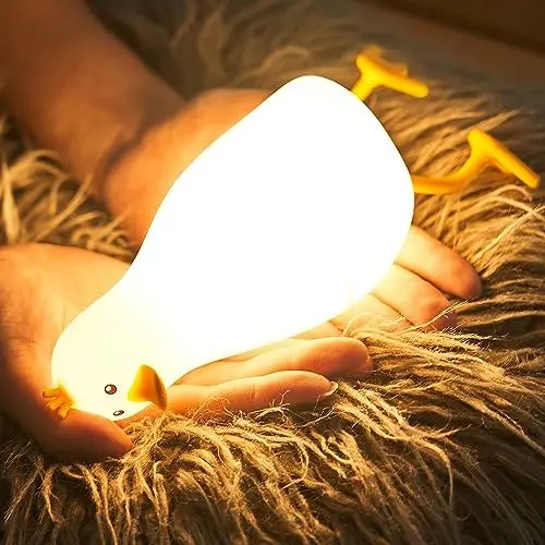 Produktbild: SALUOKE Liegende Ente Lampe, Enten Silikon Nachtlicht Kinder, 7 Farben Nachtlicht Dimmbar mit Timer, Touch-Steuerung Silikon Lampe, USB-Aufladbar Nachtlampe, Ente Geschenke für Kinder
