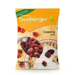 Produktbild: Seeberger Cranberries gesüßt 13er Pack: Halbierte, kanadische Cranberries fruchtig-süß - zum Snacken, als Backzutat und Verfeinern von Gerichten - getrocknet & ungeschwefelt, vegan (13 x 125 g)
