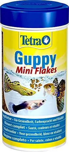 Produktbild: Tetra Guppy Mini Flakes - Fischfutter für alle Guppys, feines Flockenfutter für eine ausgewogene und nährstoffreiche Ernährung, 250 ml Dose