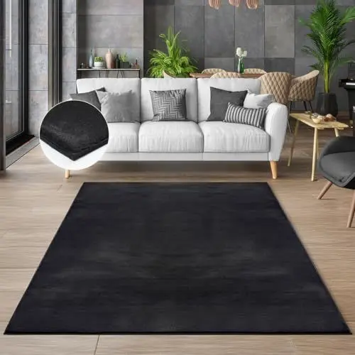 Produktbild: the carpet Cosy kuschelig Warmer Fellteppich, weich und elegant, waschbar und Fußbodenheizung geeignet, Öko-Tex Zertifiziert, Schwarz, 200 x 280 cm