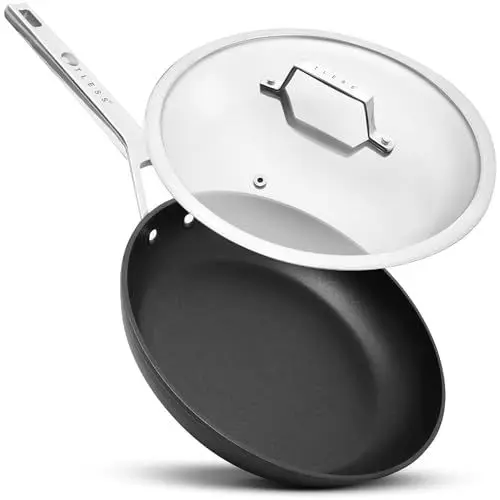 Produktbild: TLESS® Pfanne mit Deckel backofengeeignet Ø 28 cm | Bratpfanne & Universalpfanne für Induktion | sehr widerstandsfähig & spülmaschinenfest | beschichtete Pfanne in Schwarz | Jetzt Testen