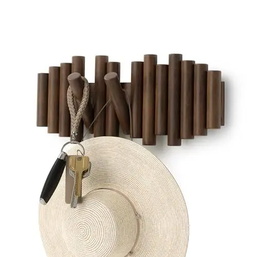 Produktbild: Umbra Picket Garderobenhaken - Garderobenleiste und Moderne Wand Dekoration mit 5 Klapphaken aus geschliffenem Kiefernholz, Walnuss Antik