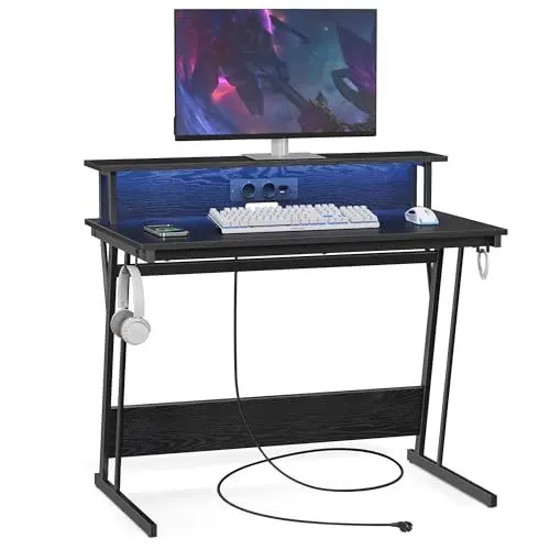 Produktbild: VASAGLE Schreibtisch, Gaming Tisch mit eingebauter Steckdosenleiste, Computertisch, mit Monitorständer für 2 Monitore, Schlafzimmer, 60 x 100 x 76 cm, ebenholzschwarz LWD191B56