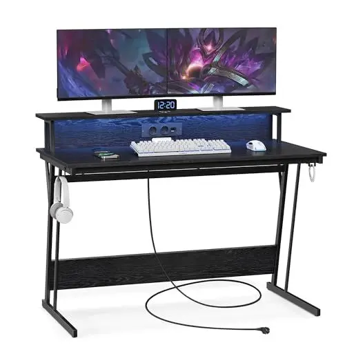 Produktbild: VASAGLE Schreibtisch, Gaming Tisch mit eingebauter Steckdosenleiste, Computertisch, mit Monitorständer für 2 Monitore, Schlafzimmer, 60 x 120 x 76 cm, ebenholzschwarz LWD192B56