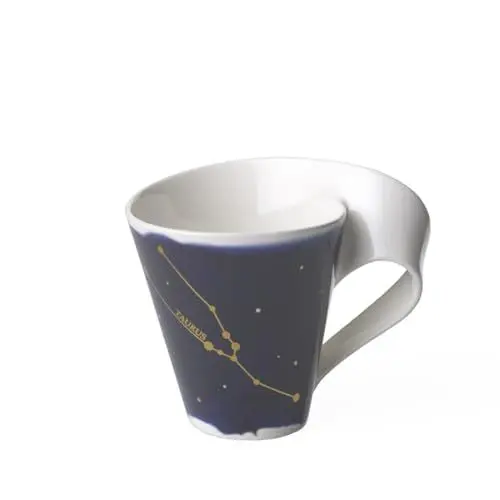 Produktbild: Villeroy und Boch - NewWave Stars Becher mit Henkel, formschöne Tasse mit Stier-Motiv, Premium Porzellan, spülmaschinengeeignet, weiß/blau, 300 ml