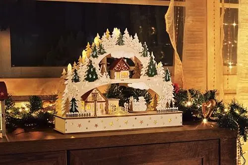 Produktbild: Weihnachtlicher Schwibbogen mit fahrenden Zug mit LED Kerzen und Timerfunktion, Weihnachtsdekoration, Holzdesign mit Winterszene, Beleuchteter Lichterbogen