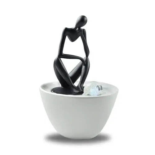 Produktbild: Zen'Light - Moderner Zimmerbrunnen Pensador mit Abnehmbarer Figur -Tischbrunnen mit Buntem LED-Licht in zeitlosem Design - Ungewöhnliche Geschenkidee für Mann oder Frau - Höhe 26 cm